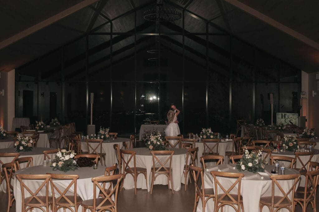 Bride and groom share special private last dance together in reception space in Desert View Weddings and Events. 