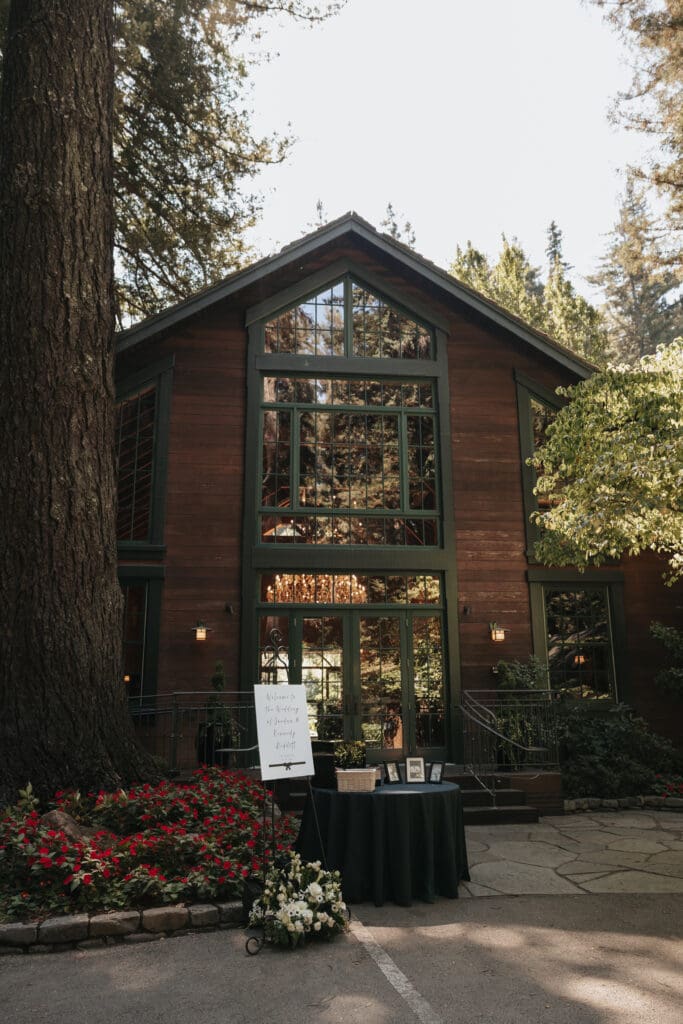 Exterior view of the iconic barn with it's giant glass windows at Nestldown wedding venue.