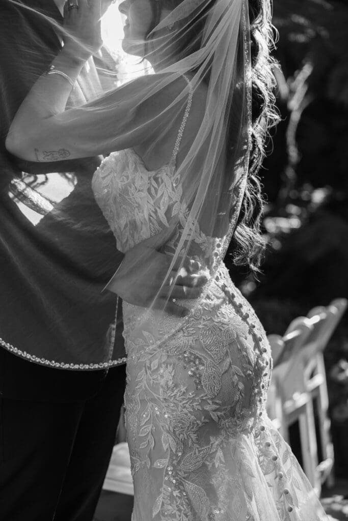 Black and white veil portrait captured during a romantic Nestldown wedding day.