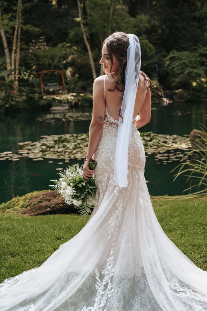 Bridal portrait overlooking the koi pond at Nestldown captured by a Nestldown wedding photographer.