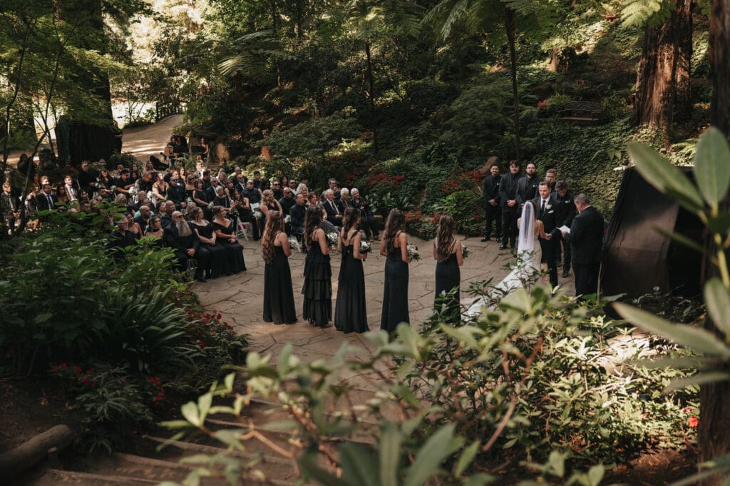 Outdoor wedding ceremony tucked into the redwoods at Nestldown in Los Gatos, California.