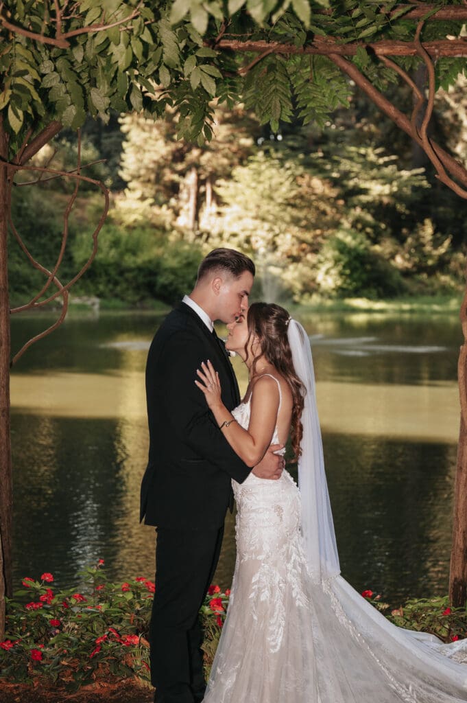 Elegant waterfront wedding portraits at Nestldown captured by a destination wedding photographer in California.