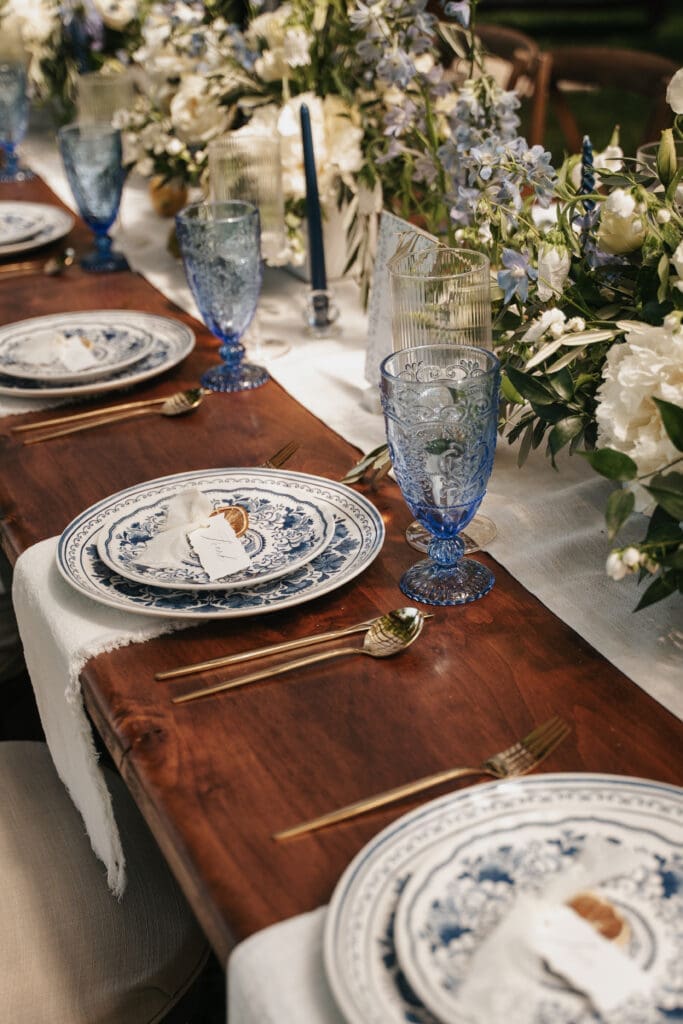 Elegant reception place setting and tablescape at Villa Catalana Cellars in Oregon captured by Scottsdale Arizona Wedding photographer.