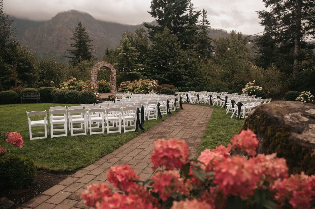 Outdoor wedding ceremony with scenic mountain backdrop at Cape Horn Estate