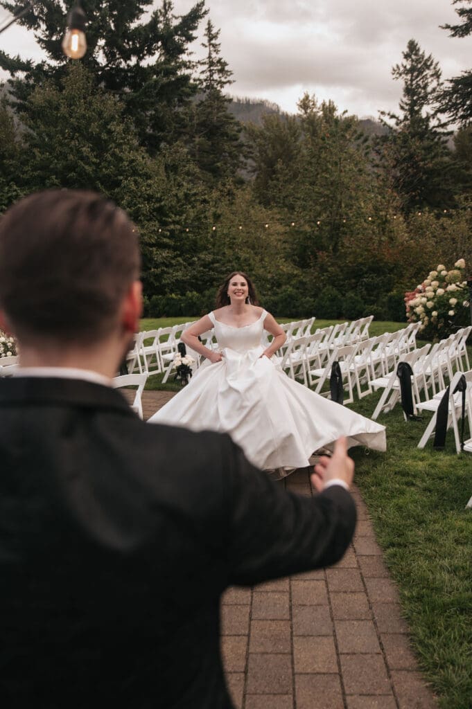 Bride candidly runs towards her groom's outstretched arms.