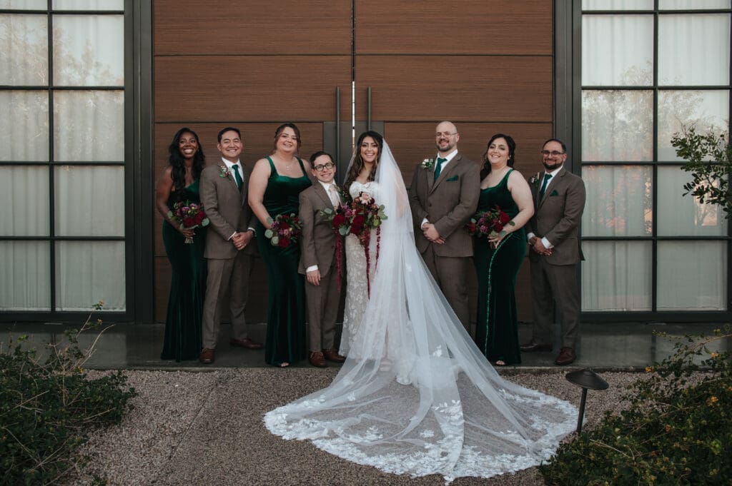 Wedding party portraits outside The Paseo Venue photographed by a Scottsdale AZ wedding photographer