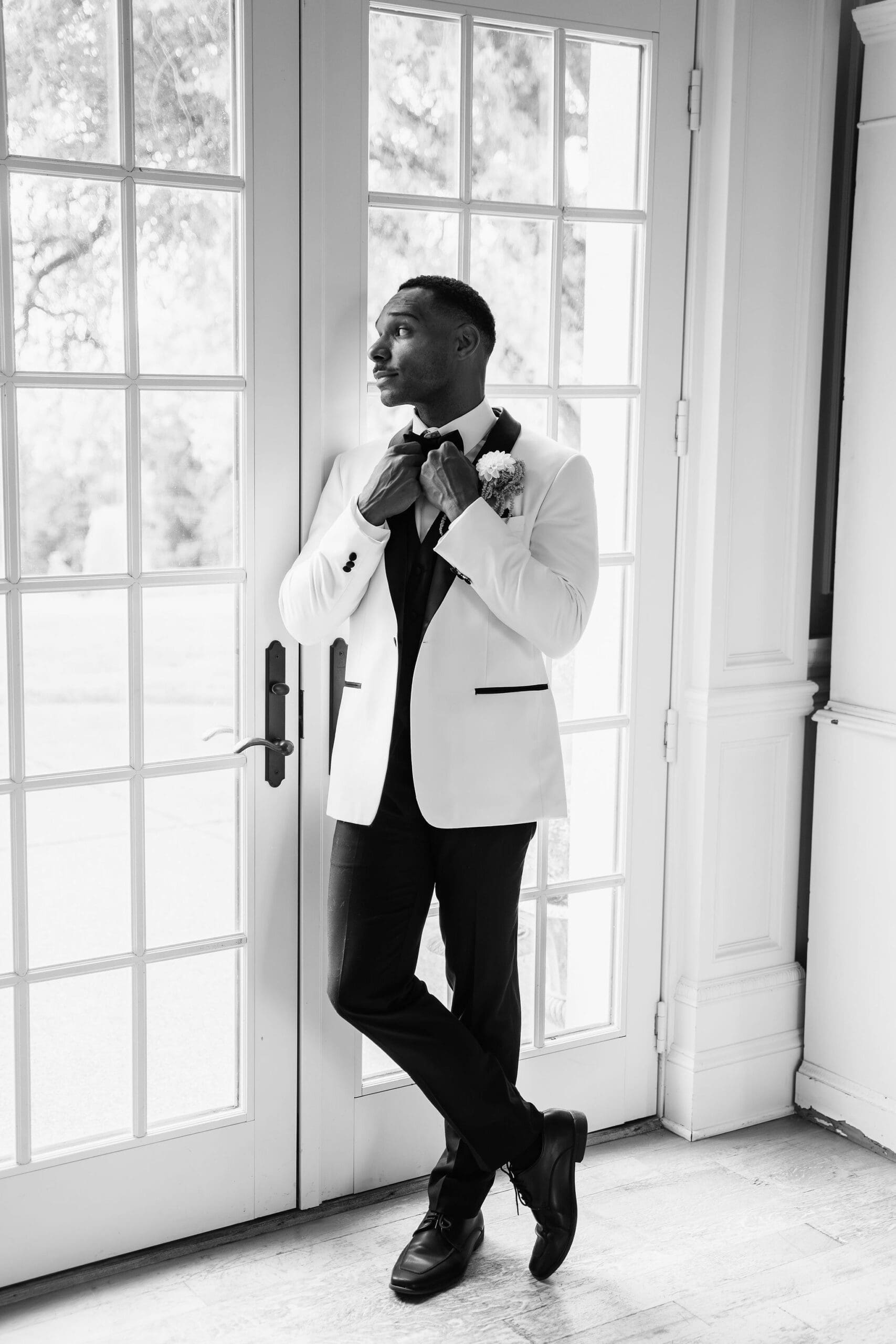 Groom in tuxedo at his HappiMiss Lavender wedding