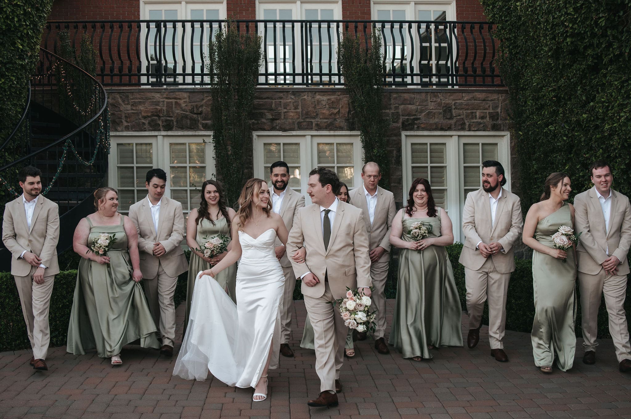 Bride and groom with their wedding party at the Stonebridge Manor wedding