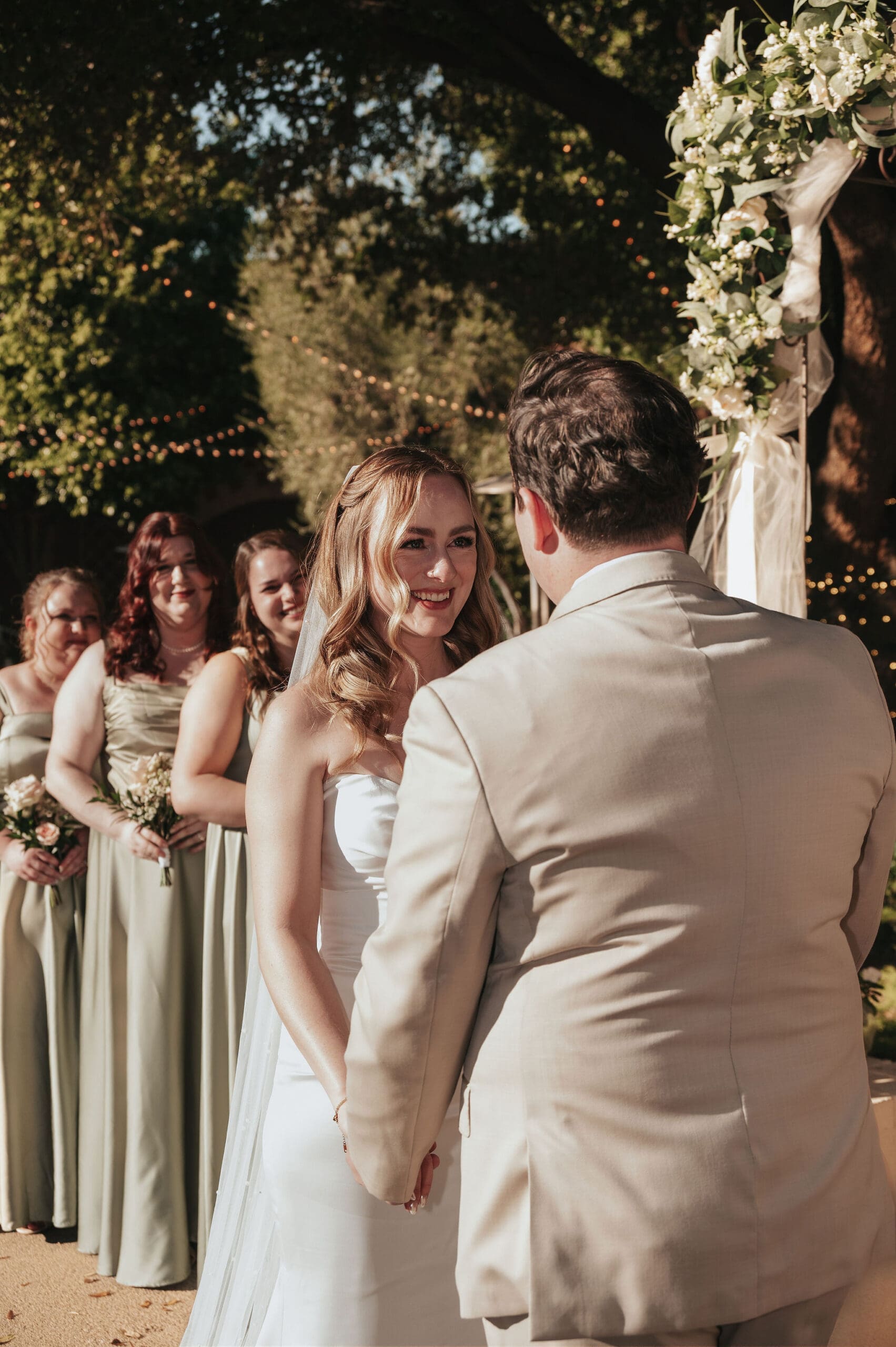 Bride and groom say vows at their Stonebridge Manor wedding ceremony