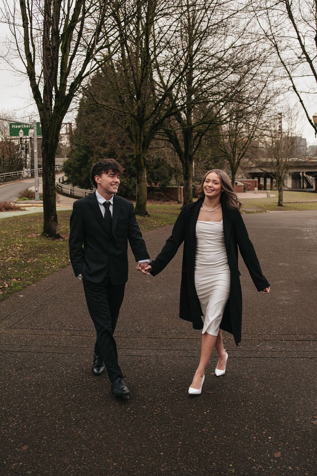 Couple holding hands during their Portland engagement photos
