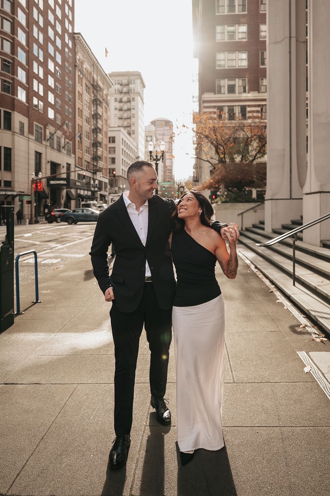 Couple walking during Portland engagement photos