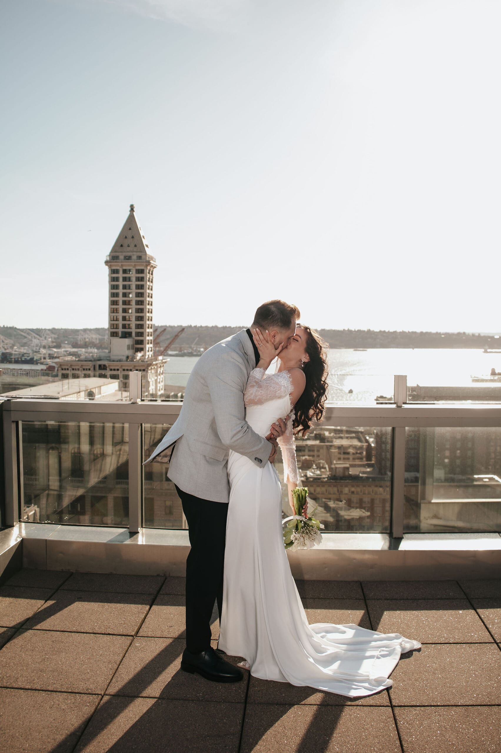 Couple kisses at their Seattle Courthouse wedding